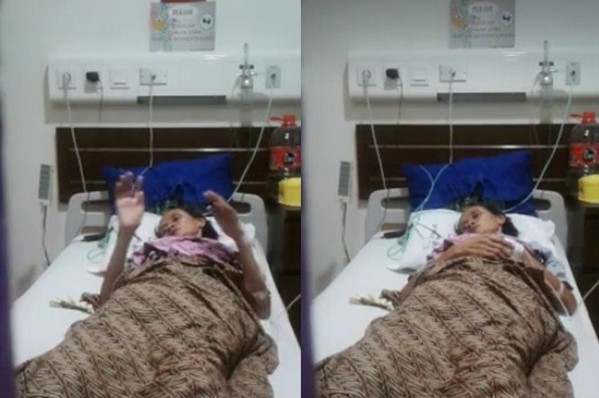 Gerakan perlahan ibu ini di kasur rumah sakit ingatkan pada Tuhan, dalam keadaan lemah kewajibannya tetap dilaksanakan
